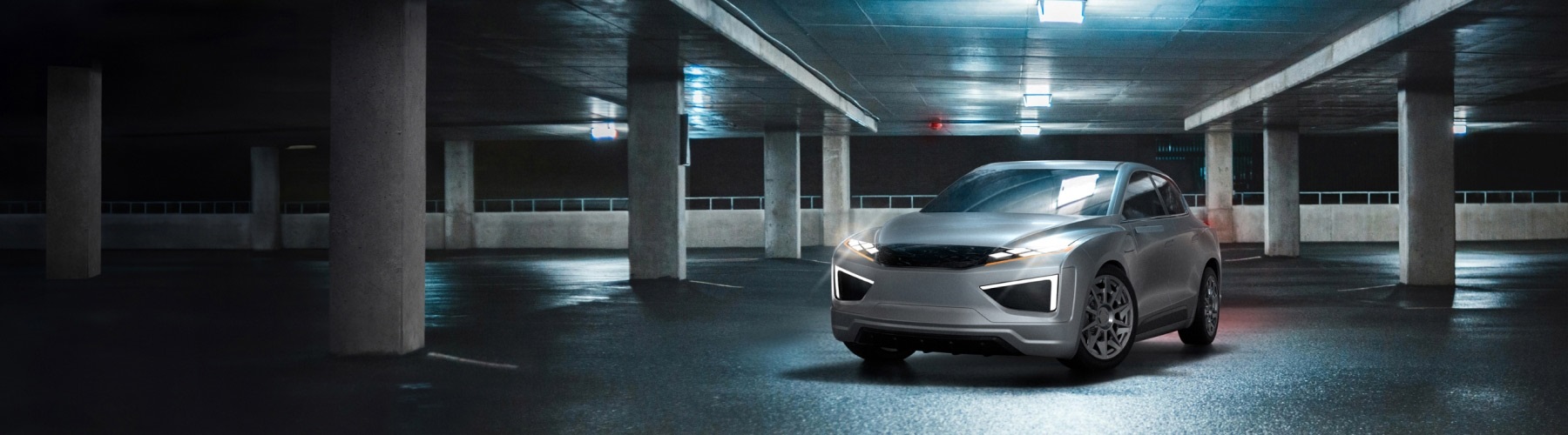 一辆现代感汽车停在灯光昏暗的地下停车场内