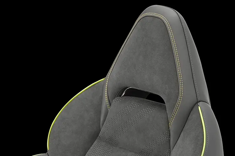 Vehicle seat made of foam with yellow stitching