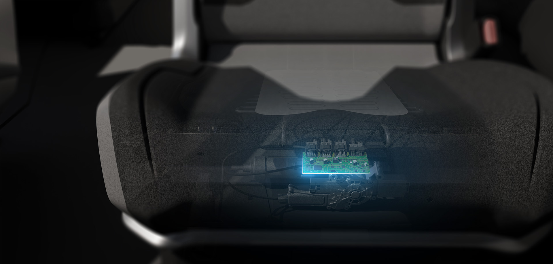 Seat electronics shown inside of a vehicle bucket seat