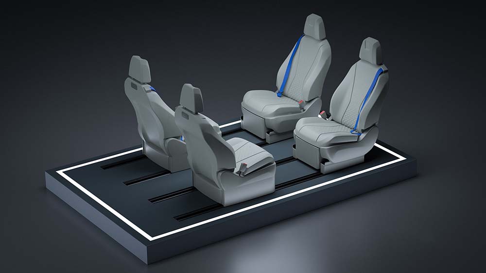 Magna’s reconfigurable seating system offers flexibility for more in-cabin space