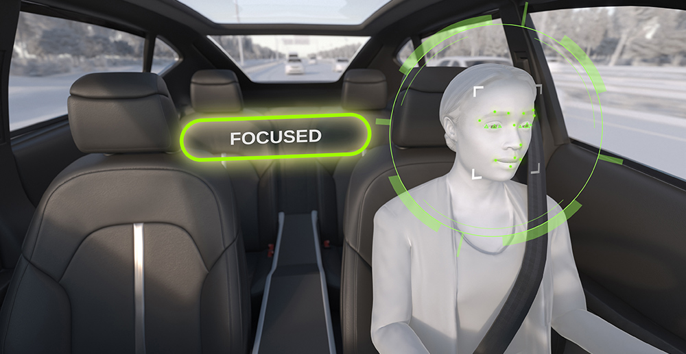 Interior cabin monitoring system identifying a focused driver using facial tracking and AI-based sensing for intelligent vehicle safety.